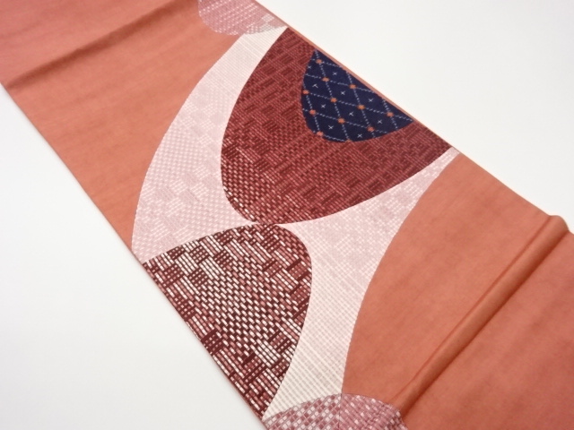 手織り紬切り嵌め曲線に幾何学模様織出し袋帯